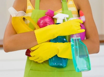 Lady Holding Cleaning Products